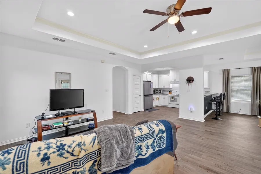 Living room open to the kitchen and dining area at 4552 Corregidor St